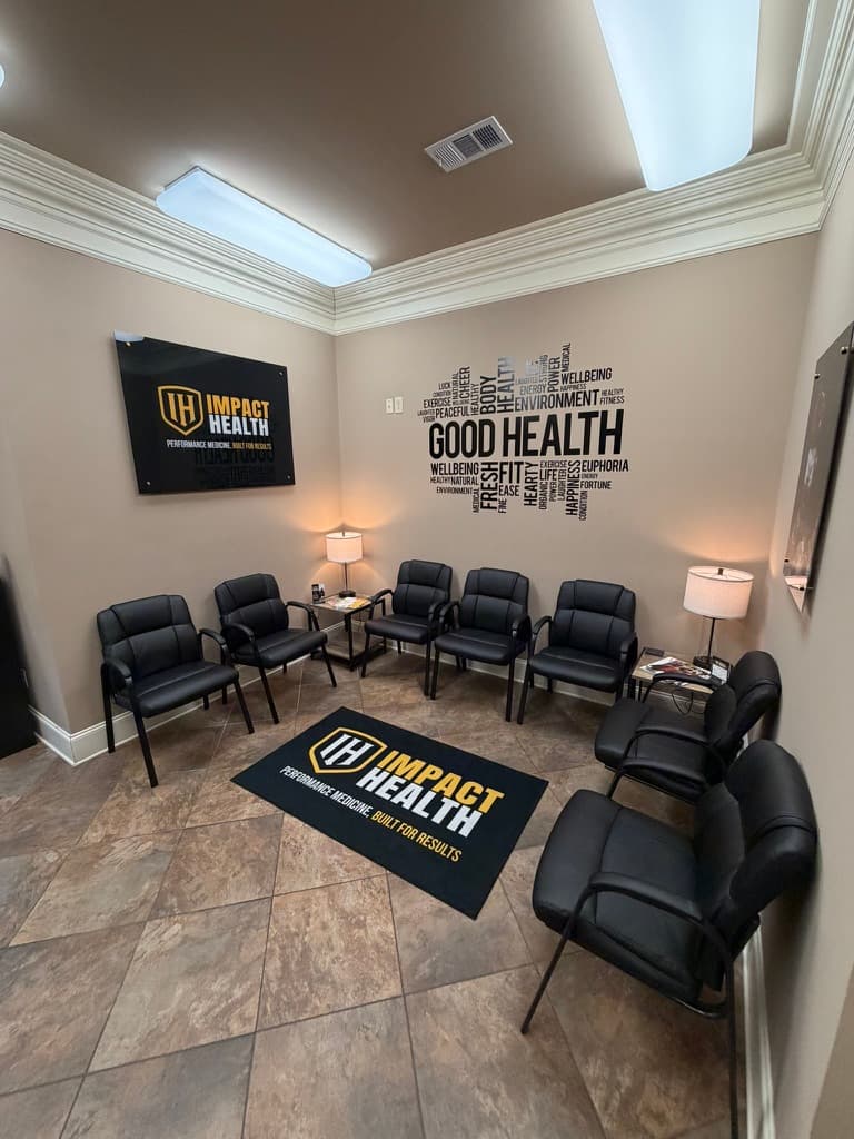 Impact Health Oxford lobby, framed Impact Health sign on charcoal wall